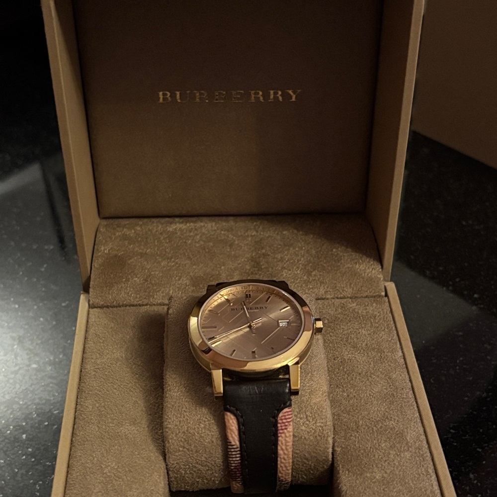 Burberry Women’s Watch with Gold Case and Black Strap